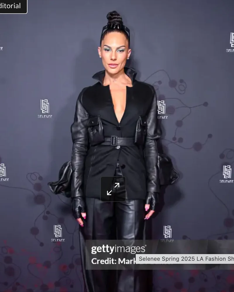 Amanza Smith posing in a black leather look at the Selenee Spring 2025 runway show